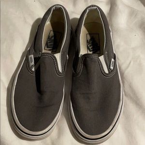 Dark gray slip on vans